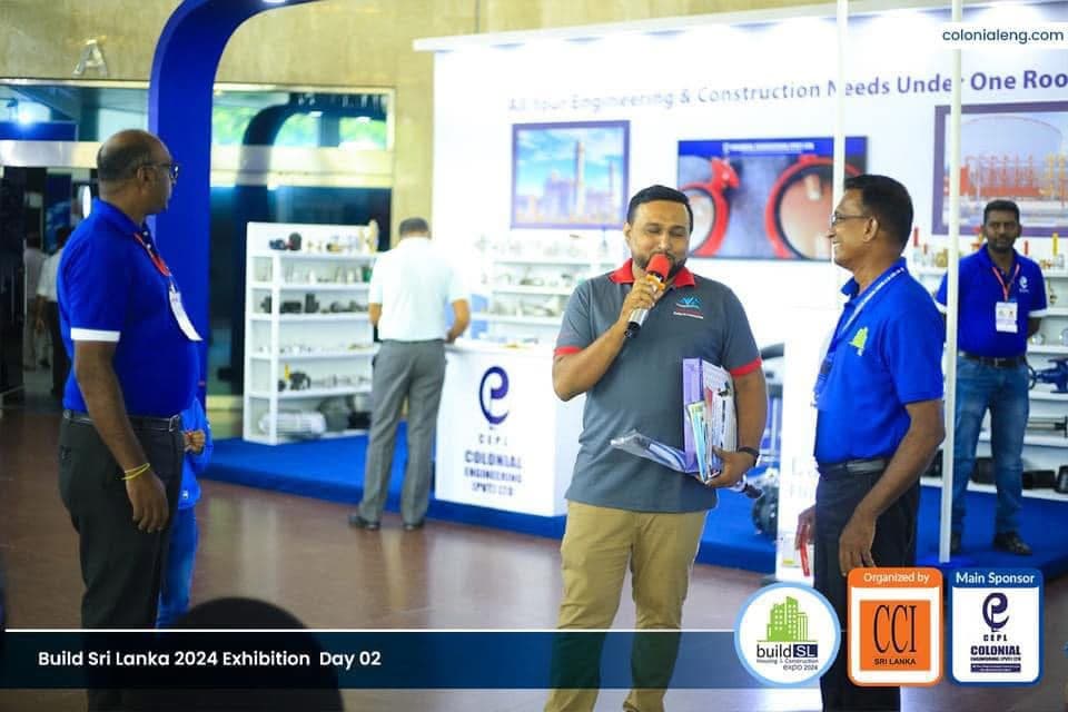 SS Builders representative receiving a presentation at the Build Sri Lanka 2024 Exhibition